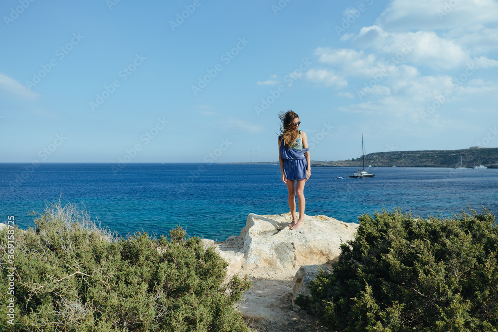 Young woman seaside windy portrait Young woman seaside windy portrait
