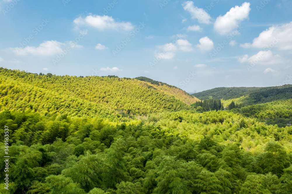 Aerial view of mountain with blue sky Aerial view of mountain with blue sky