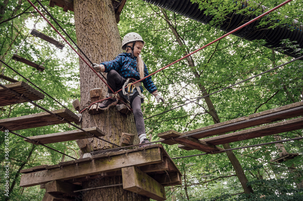 People: Girl at a high wire park People: Girl at a high wire park