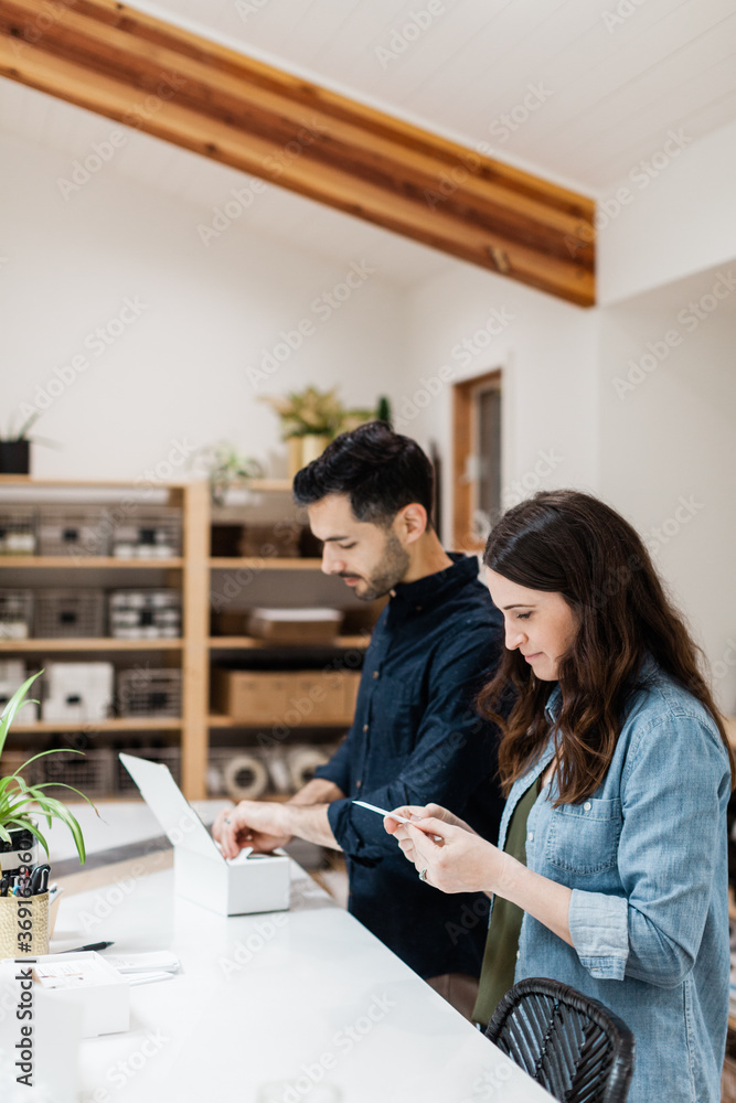Husband and Wife Small Business Owners in Home Office Husband and Wife Small Business Owners in Home Office