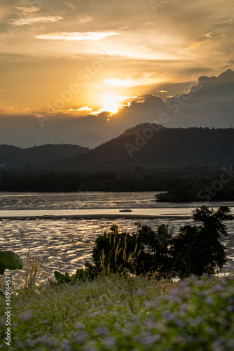 Beautiful scene of sunset magic sky at lake in bang-rong PHUKET