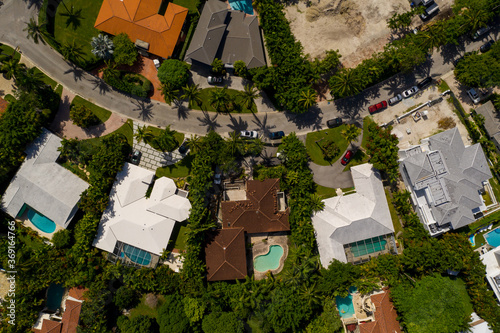 Aerial overhead shot of luxury homes with palm trees Miami Beach Bal Harbour