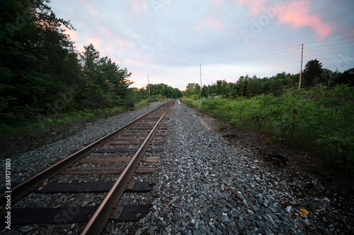 railroad tracks sunset