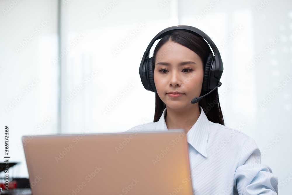 Business asian woman happy working job on laptop in office. Business asian woman happy working job on laptop in office.