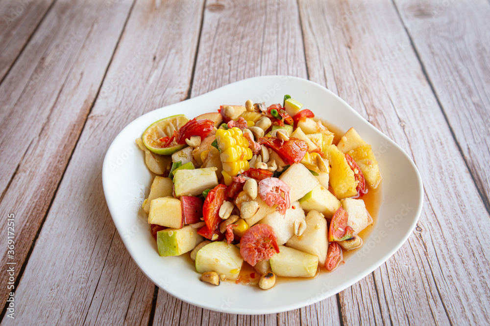 Thai fruit salad - mix fruit salad on dish. Thai fruit salad - mix fruit salad on dish.