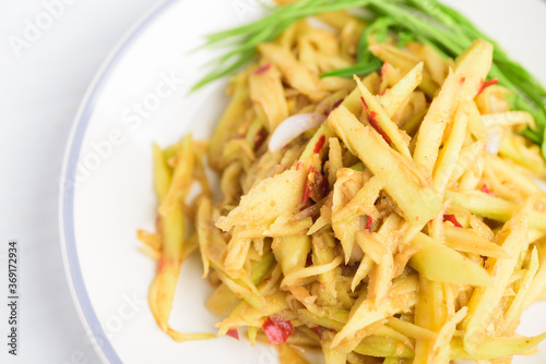 Thai food, spicy green mango salad (Tum Ma Muang)