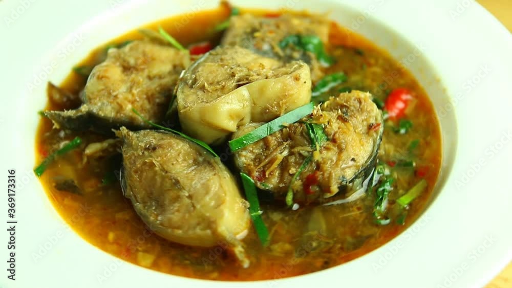 Fried cat fish with chili paste in plate, in door  Chiangmai Thailand