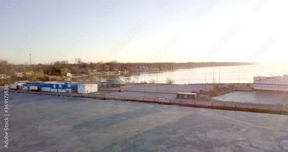 Drone Flying Over The Dock In Kingsville, Ontario, Canada On A Sunny Winter Morning - aerial drone Drone Flying Over The Dock In Kingsville, Ontario, Canada On A Sunny Winter Morning - aerial drone