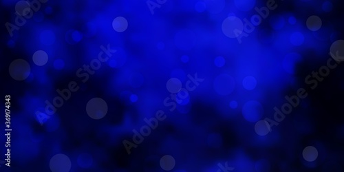 Dark BLUE vector backdrop with dots. Glitter abstract illustration with colorful drops. Pattern for websites.