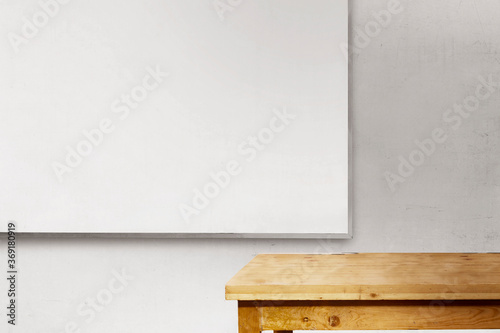 Desk and whiteboard inside the classroom