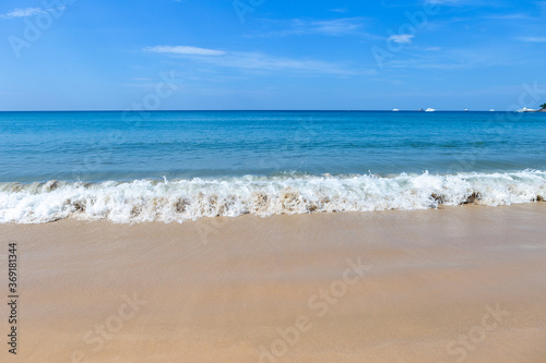 Summer holiday on beautiful beach  tropical island  summer outdoor day light  clean sea water and fine sand beach  relaxing by the sea
