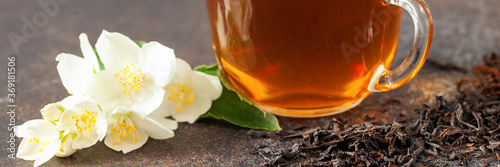 Cup of tea with jasmine flowers