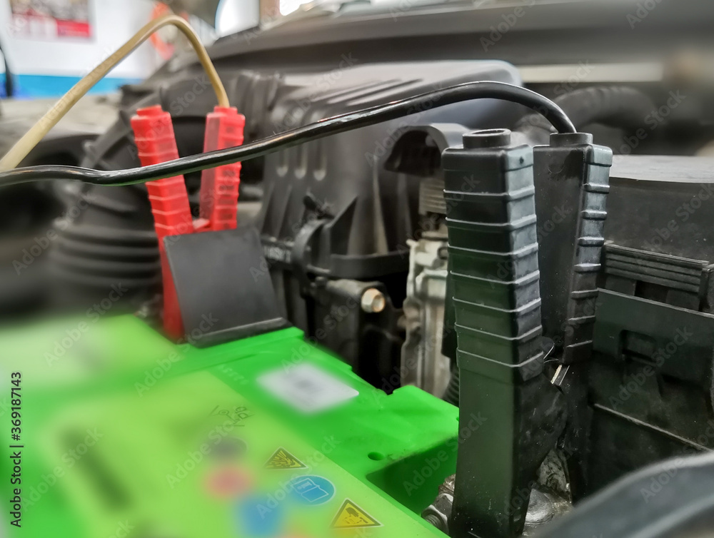 an image of charging car battery