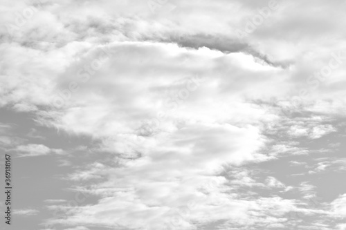 Gray sky with white clouds. Beautiful sky background and wallpaper. Concept Storm Clouds Raining.