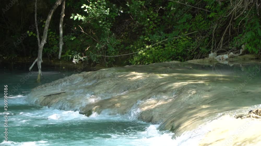 river and waterfalls of the Elsa river in the Colle Val d'Elsa river park. siena tuscany italy. river and waterfalls of the Elsa river in the Colle Val d'Elsa river park. siena tuscany italy.