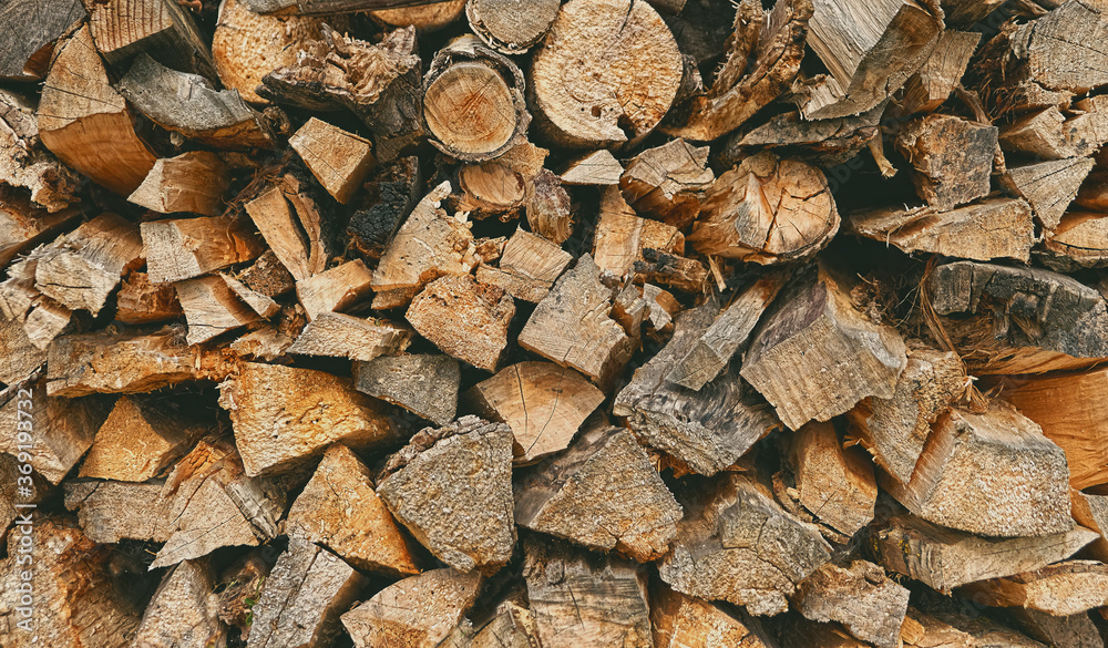 woodpile background. Chipped firewood full frame. template for design