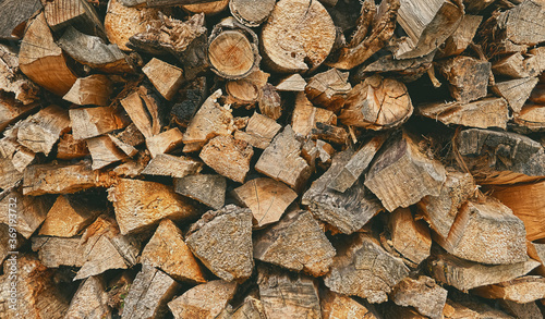 woodpile background. Chipped firewood full frame. template for design