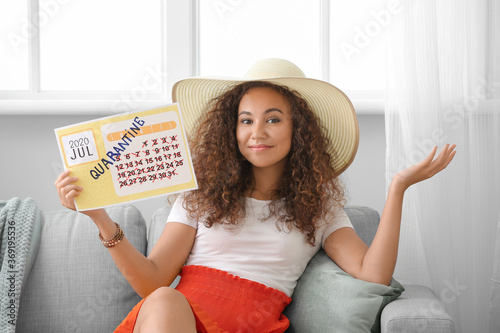 Young woman with calendar d...