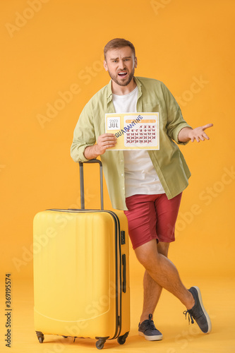 Angry man holding calendar ...