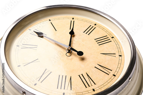 Simple clock on white background, closeup