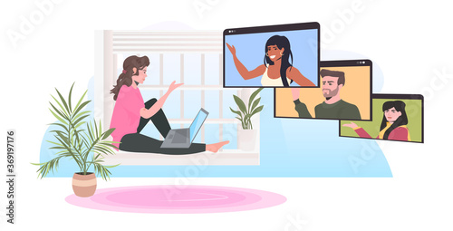 woman sitting on windowsill chatting with mix race colleagues in web browser windows during video call online conference meeting remote work self isolation concept horizontal vector illustration