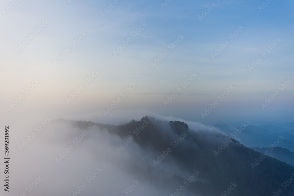beautiful view on top mountain and mist at morning light. soft focus.