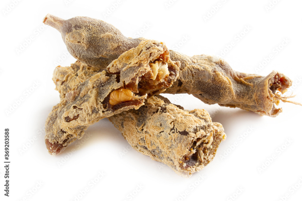 Walnuts on a string dipped in starch grape molasses. Churchkhela. Walnut sujuk. Walnuts on a string dipped in starch grape molasses. Churchkhela. Walnut sujuk.