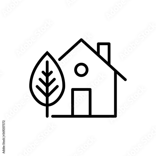 Concepto casa verde. Ecología. Icono plano lineal casa con árbol en jardín en color negro