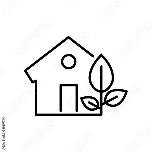Concepto casa verde. Ecología. Icono plano lineal casa con hoja de árbol en color negro