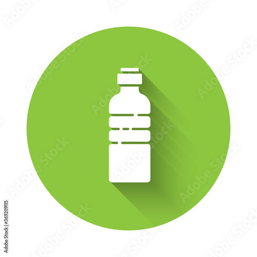 White Bottle of water icon isolated with long shadow. Soda aqua drink sign. Green circle button. Vector Illustration.