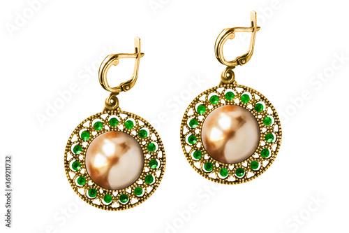 Gold earrings isolated