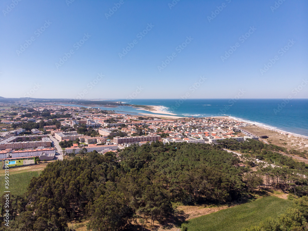 The marginal riverside, along the mouth of the Cavado River in Esposende, Portugal. The two sides of Restinga de Ofir. One facing the ocean, the other the estuary of Cávado River.