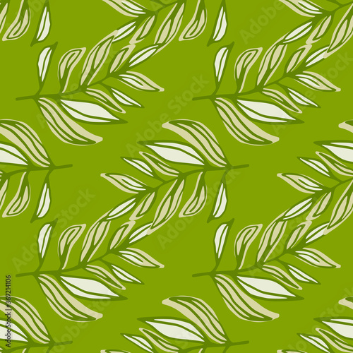 Spring seamless pattern with contoured foliage brunches in green tones. Stylized floral print.