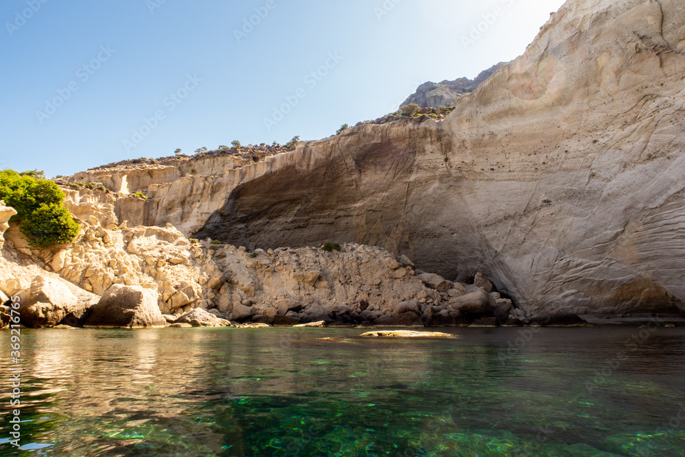 Fototapeta premium Kleftiko - collapsed rocks forming hidden cave due to volcanic activity, on the southwest coast of Milos Island, Greece. 
