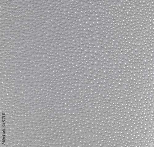 Grey background filled with bubbles and white oxygen, in underwater clear liquid with bubbles flowing up on the water surface.