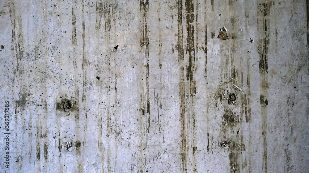 Naklejka premium Concrete surface of a building wall. Defocused background for web design