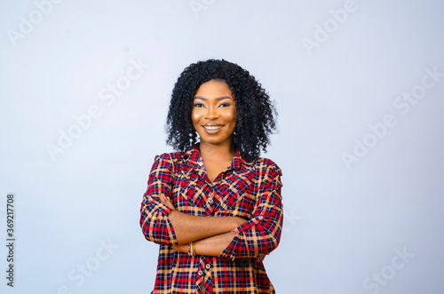 a young beautiful african lady isolated over white background feels overexcited © Vic Josh