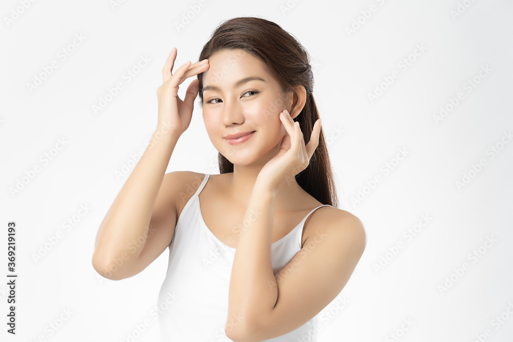 Beautiful Young asian Woman with Clean Fresh Skin on white background, Face care, Facial treatment, Cosmetology, beauty and spa, Asian women portrait Beautiful Young asian Woman with Clean Fresh Skin on white background, Face care, Facial treatment, Cosmetology, beauty and spa, Asian women portrait