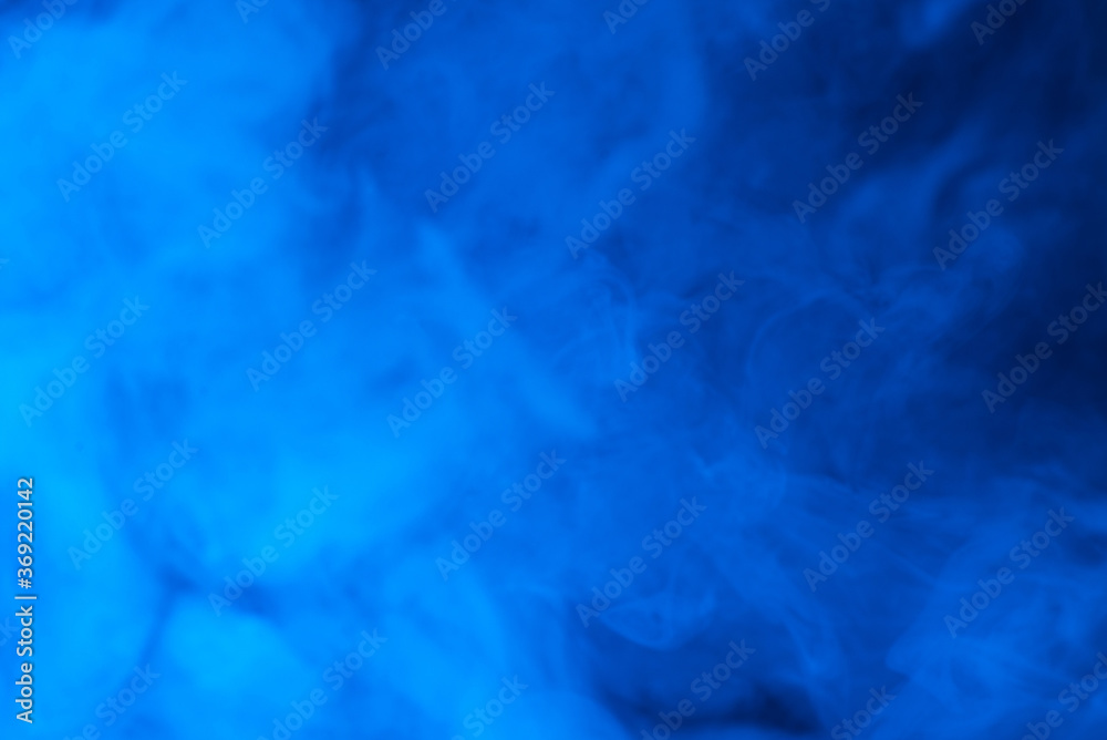 Blue steam on a black background. Blue steam on a black background.