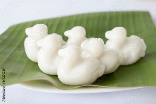 Nata de coco or young coconut milk jelly duck shape (Wun Kati) on banana leaf is a Thai dessert.