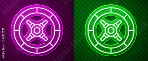 Glowing neon line Safe icon isolated on purple and green background. The door safe a bank vault with a combination lock. Reliable Data Protection. Vector Illustration.