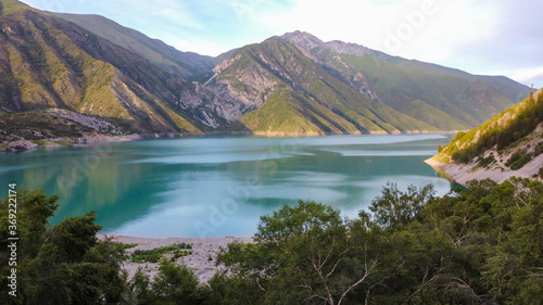 Beautiful mountain turquoise color lake Karasuu in Tian-Shan, Kyrgyzstan.