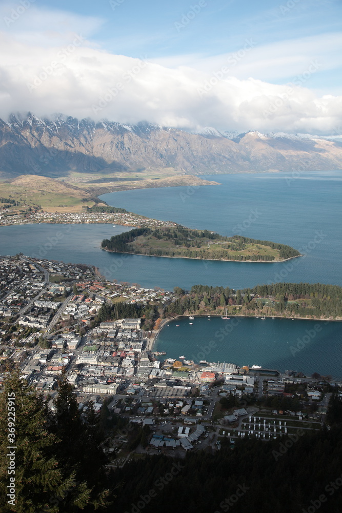 Aerial view of Queenstown and Lake Wakatipu with the Remarkables mountain range during Winter, New Zealand