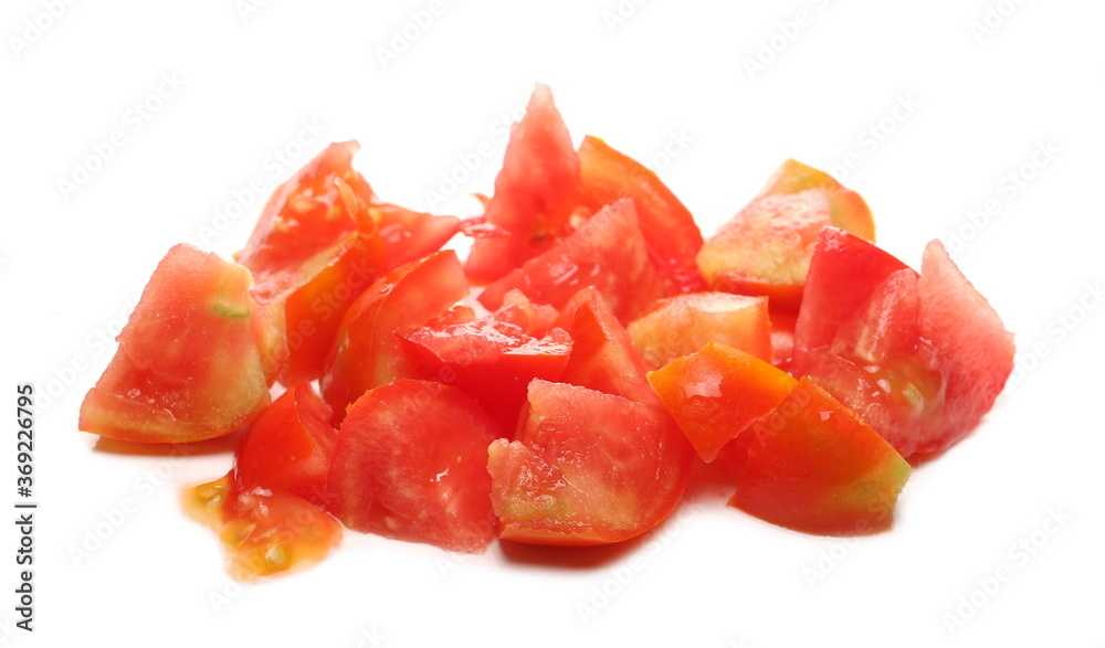 Tomato slices, chunks pile isolated on white background Tomato slices, chunks pile isolated on white background