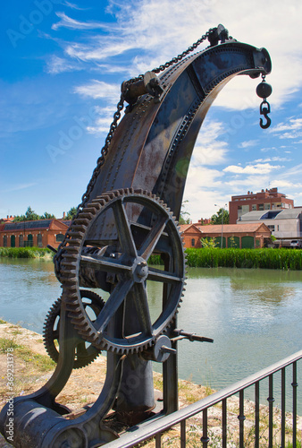 Antigua grua para estiba en la darsena del Canal de Castilla en Valladolid photo