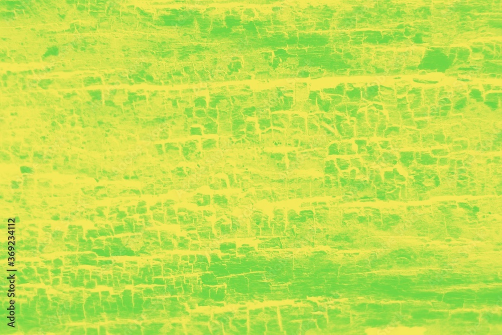 Vivid green yellow patchy background, wooden texture