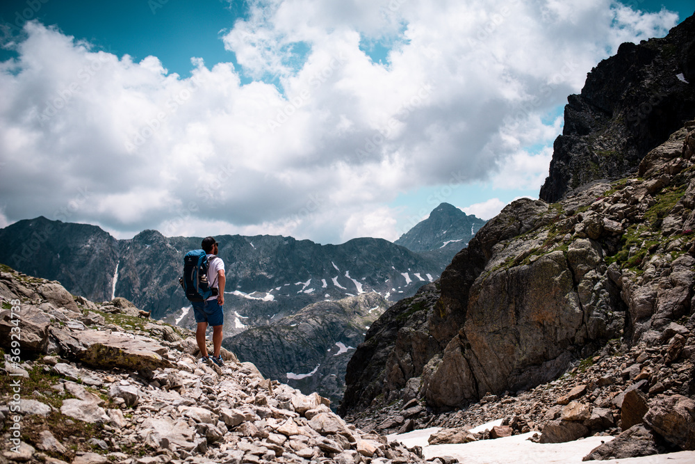 Hinking in the alps mountain with backpack and landscape