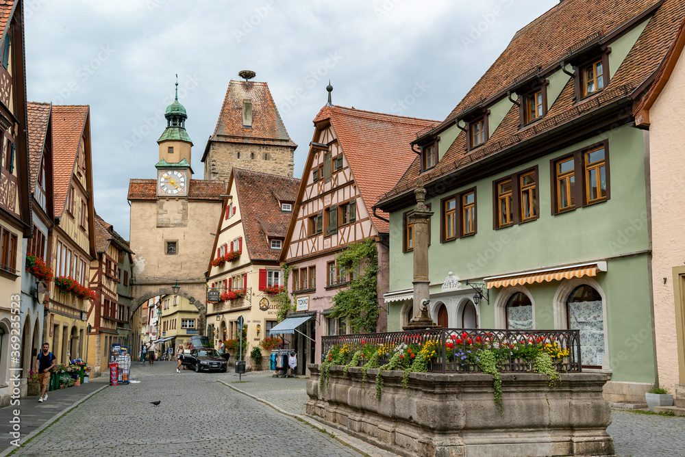 a view of one of the many city gate guard towers in the medieval Bavarian city of Rothenburg ob der Tauber