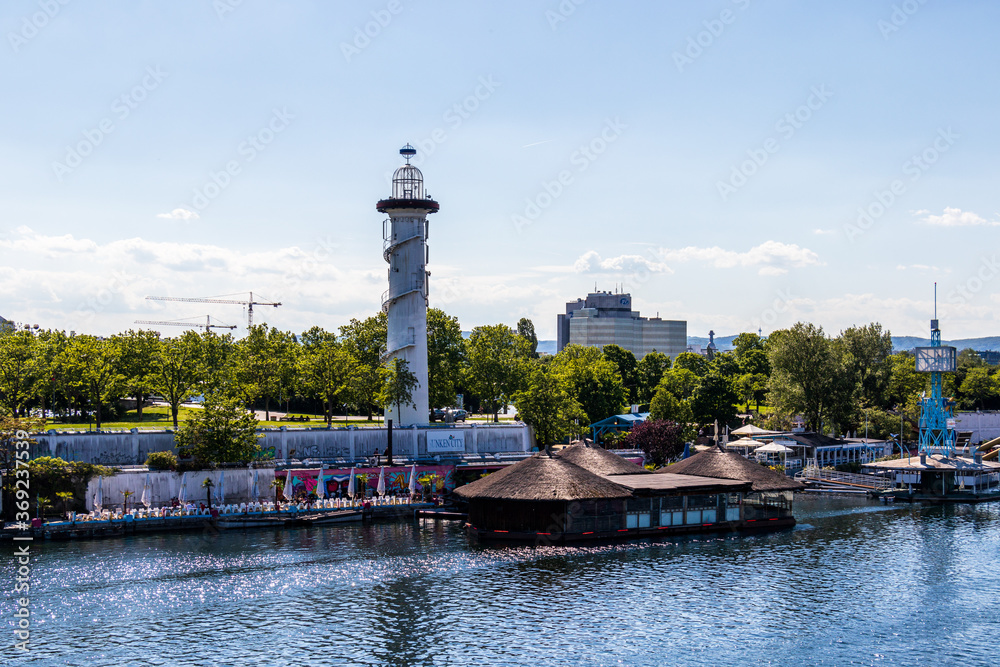 View on Sunken City Park with Lighthouse, Danube Island and River in Vienna, Austria, Europe