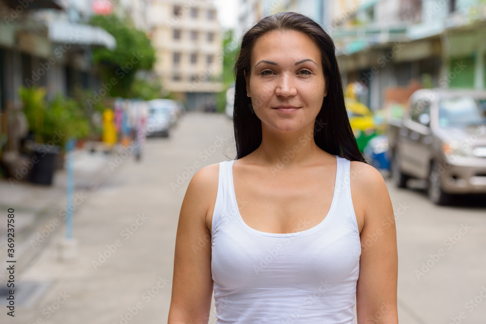 Portrait of beautiful woman in the streets